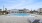 a swimming pool and poolside lounging