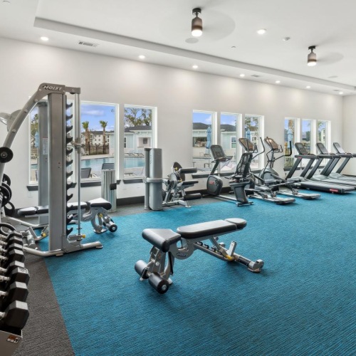 Quick access to state-of-the-art amenities a gym with exercise equipment
