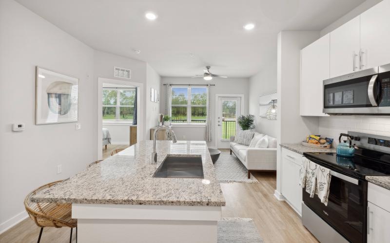 a kitchen with a marble countertop